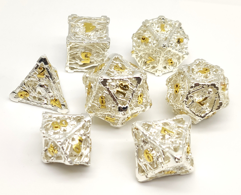 La main portative a versé l'ensemble minuscule de matrices, métal plaqué par or Mini Dice